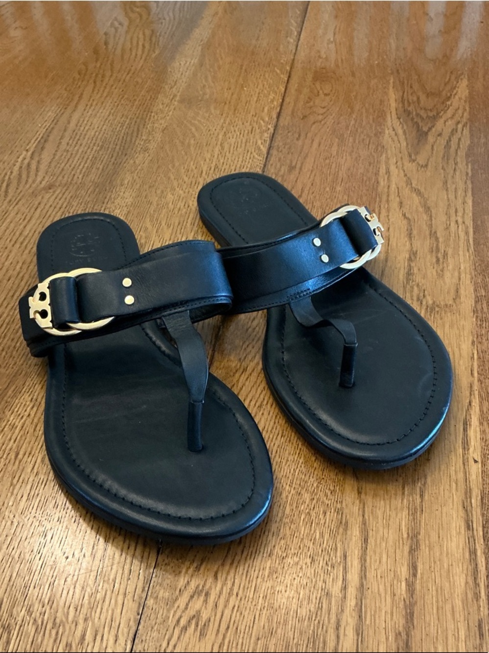 Tory Burch Black Leather Thong Sandals with Gold Logo Buckle